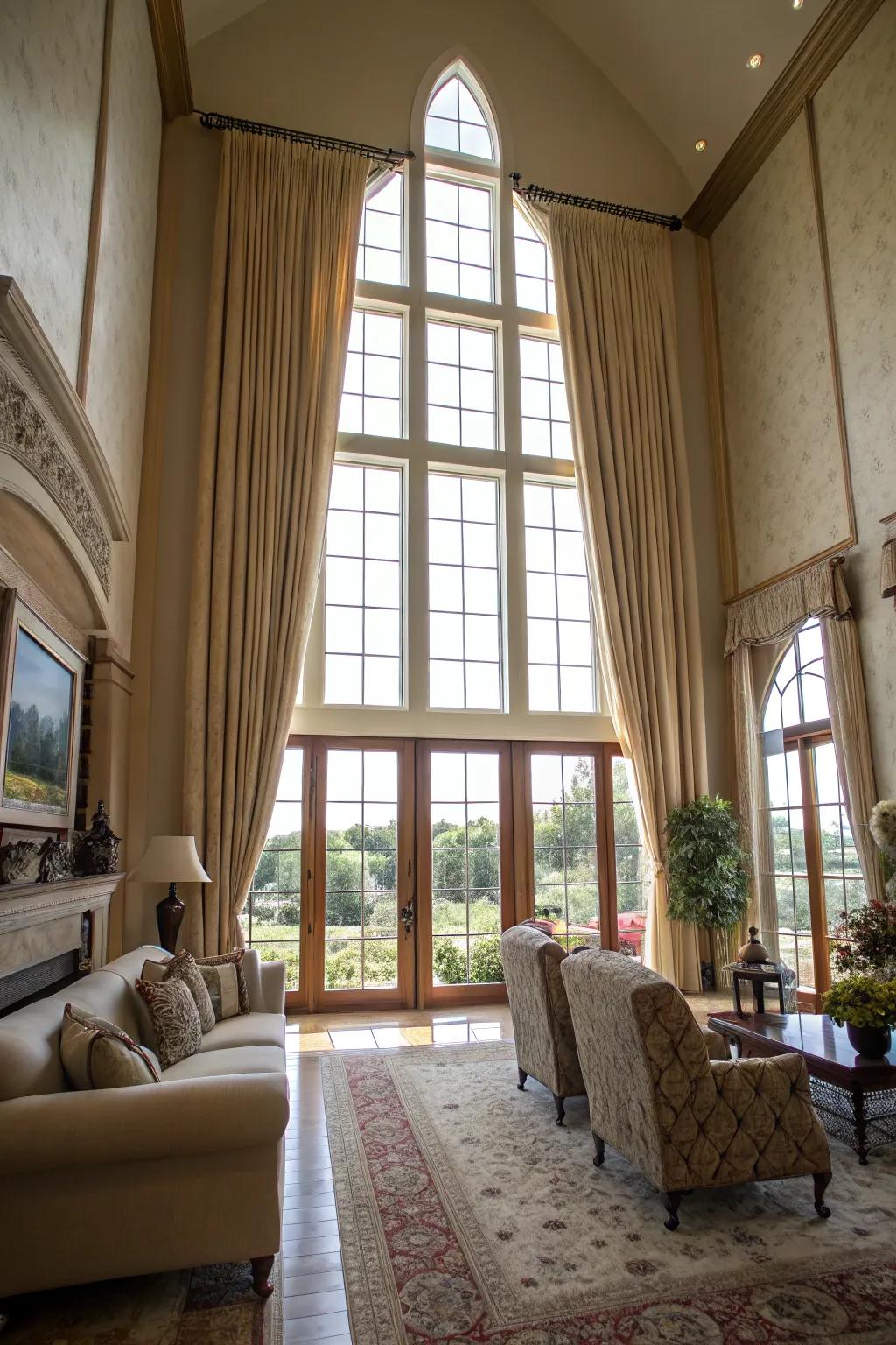 Towering draperies visually extend walls upward, enhancing the sophisticated ambiance of rooms with high ceilings.