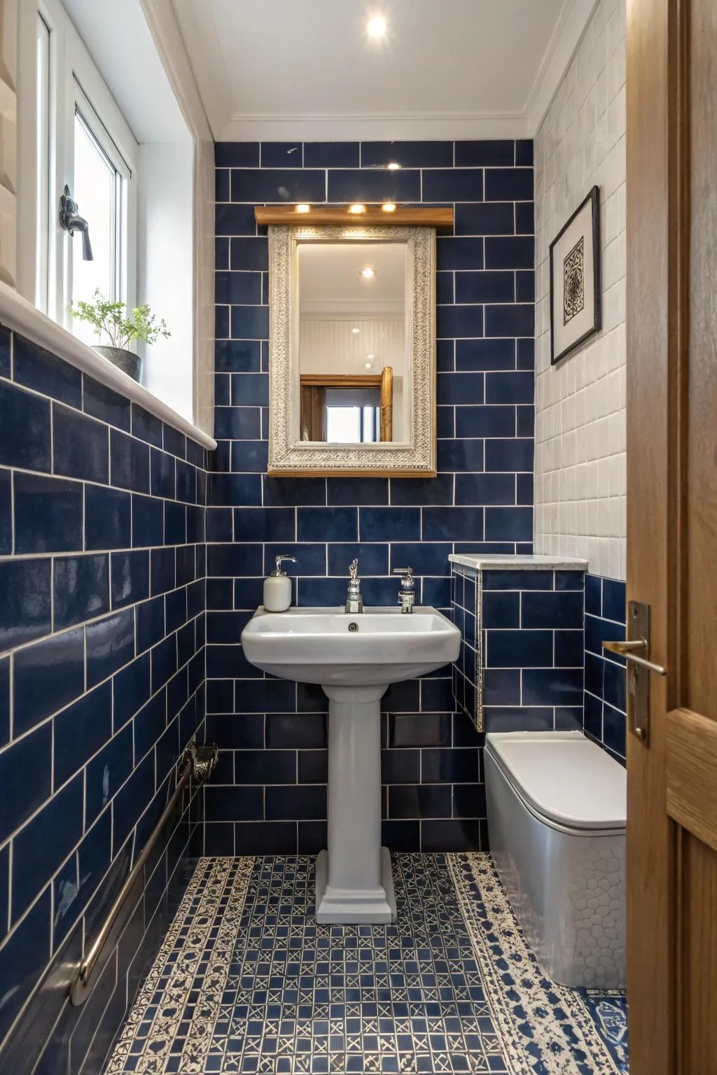 Navy blue tiles create a dramatic yet elegant atmosphere in this small bathroom.