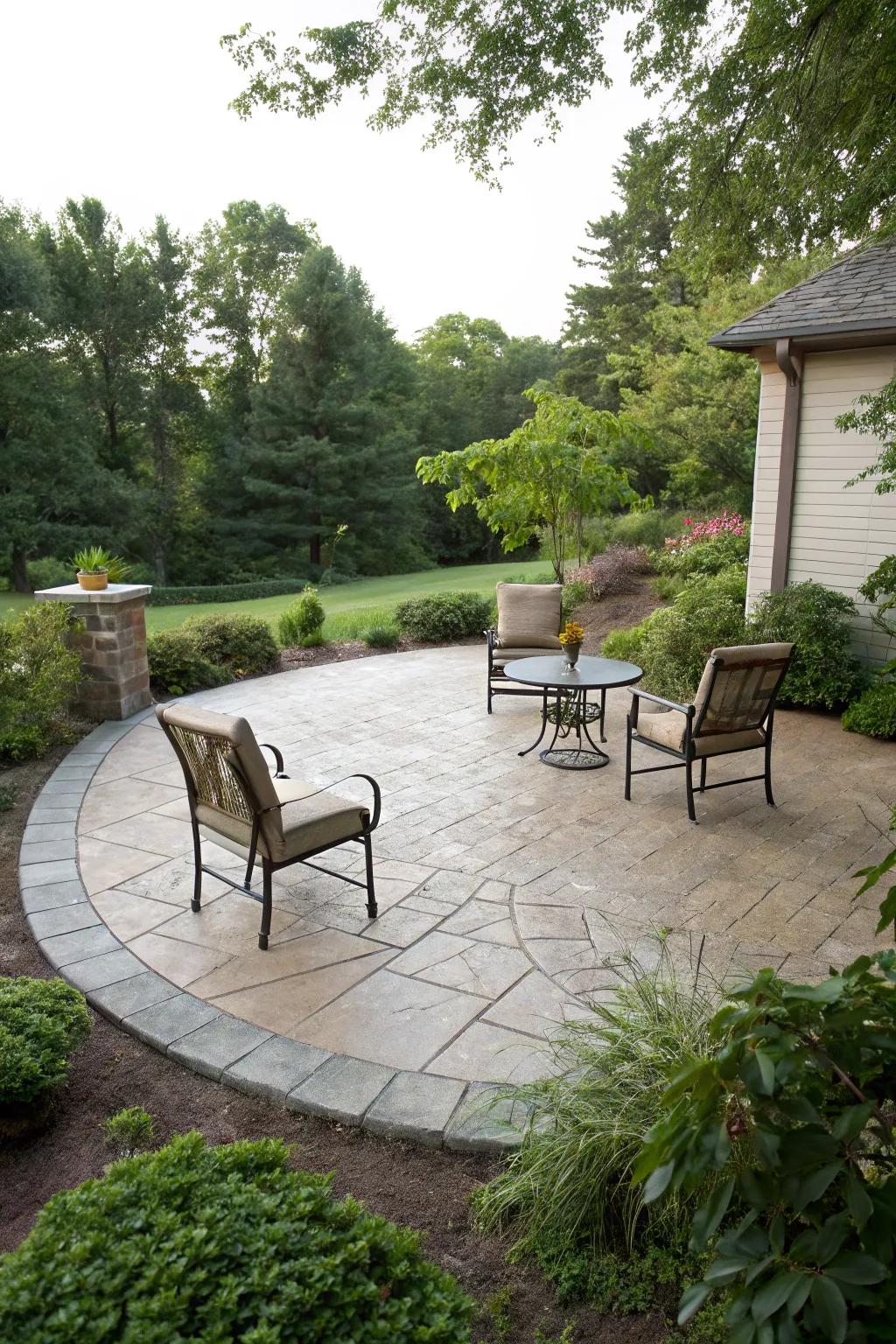 A circular stamped concrete patio offering a cozy retreat.