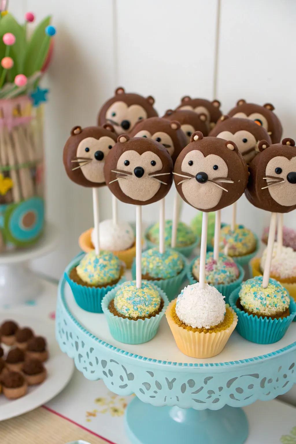 Enjoy otter-themed cake pops for a delightful snack.