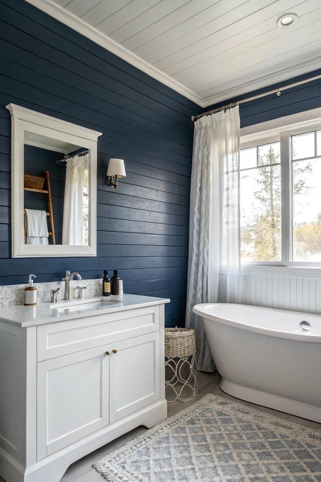 A bathroom featuring deep blue board and batten for a bold statement.