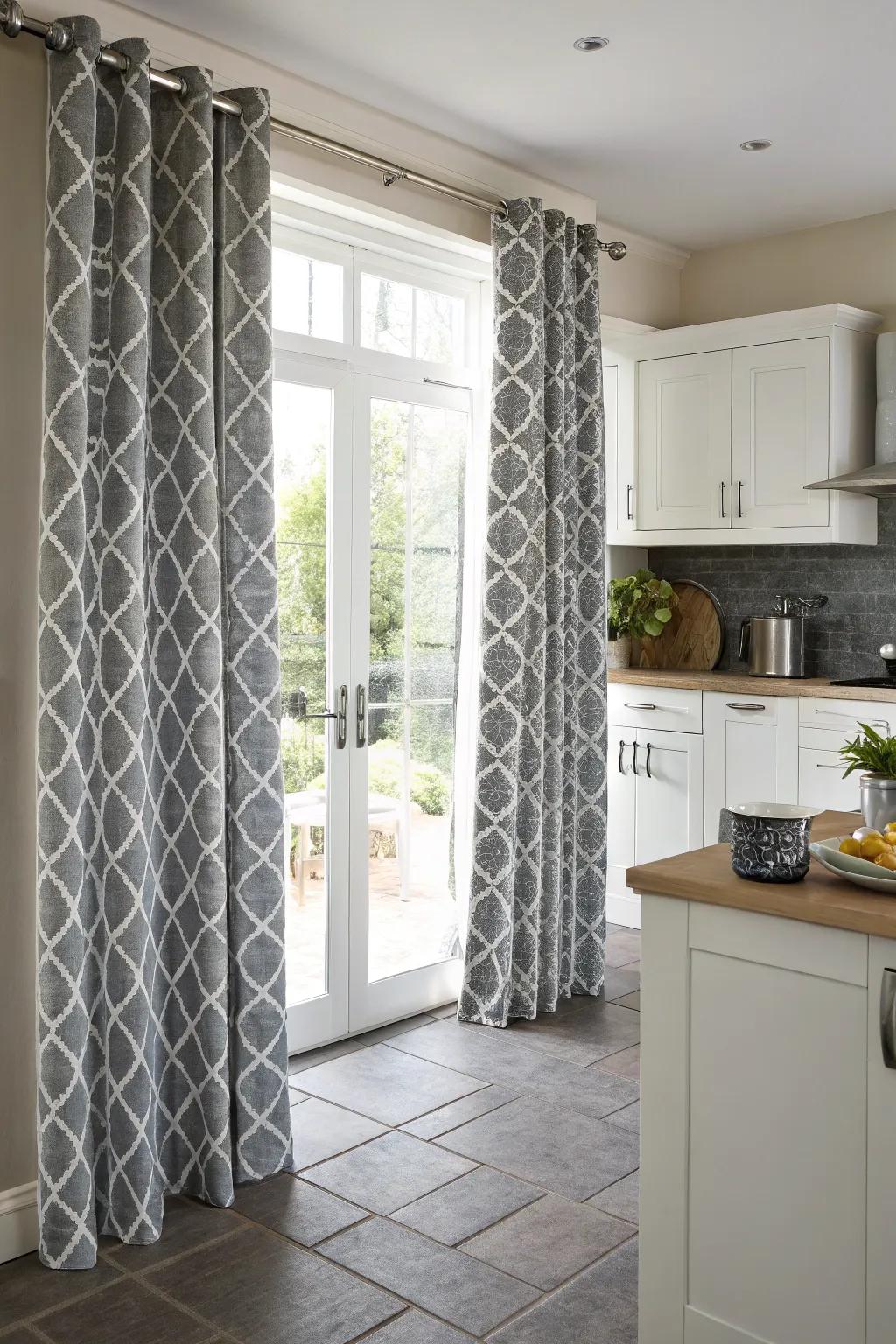 Daring geometric patterned gray window coverings for a contemporary artistic composition-inspired culinary space.