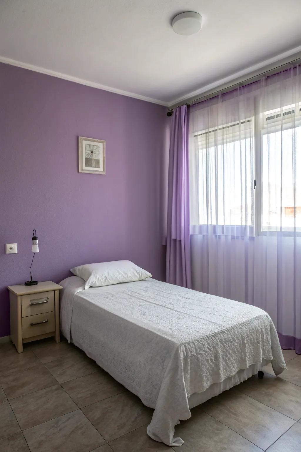 Minimalist approach allowing purple walls to shine.