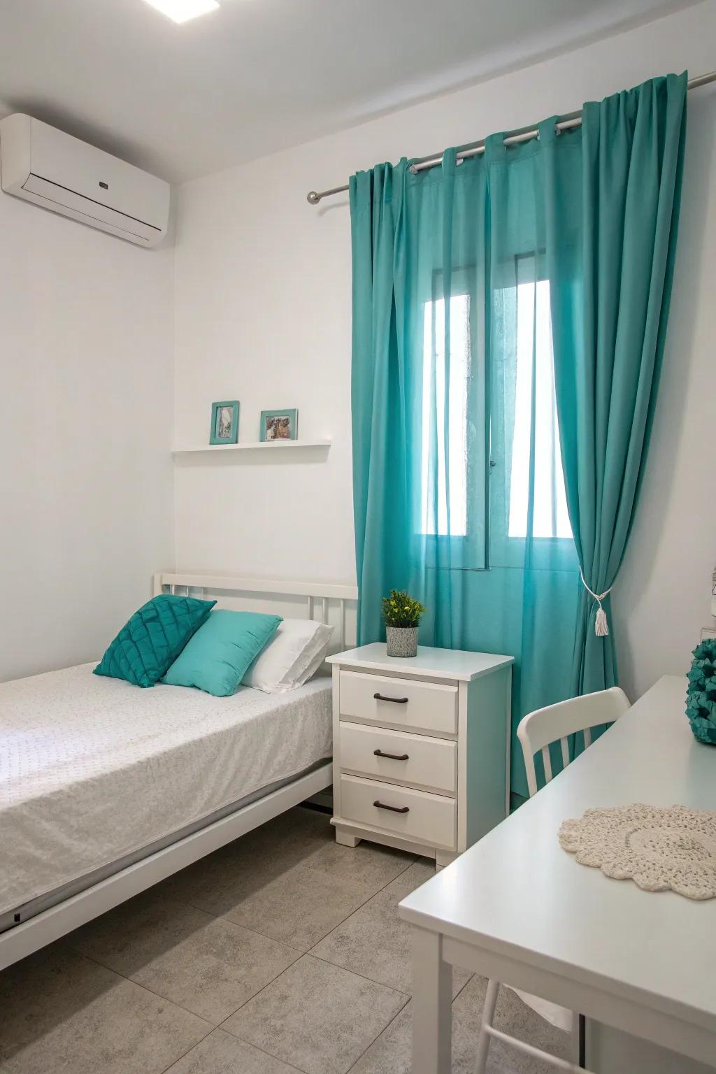 Minimalism meets personality with turquoise accents in this sleek bedroom.