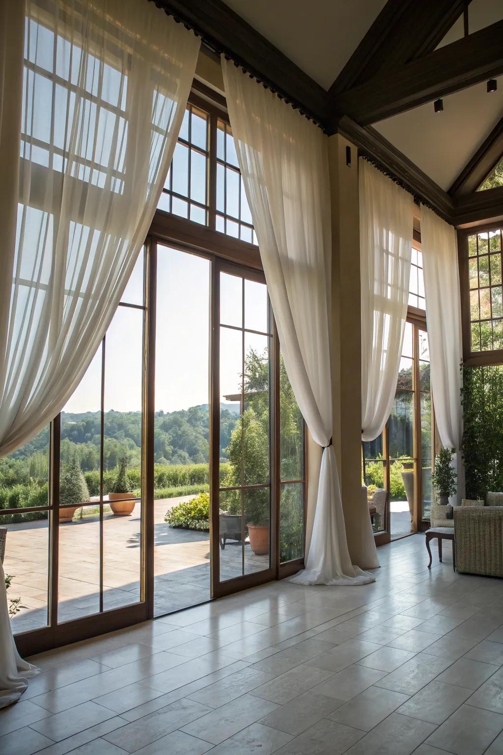 Sheer drapes create a seamless indoor-outdoor flow.