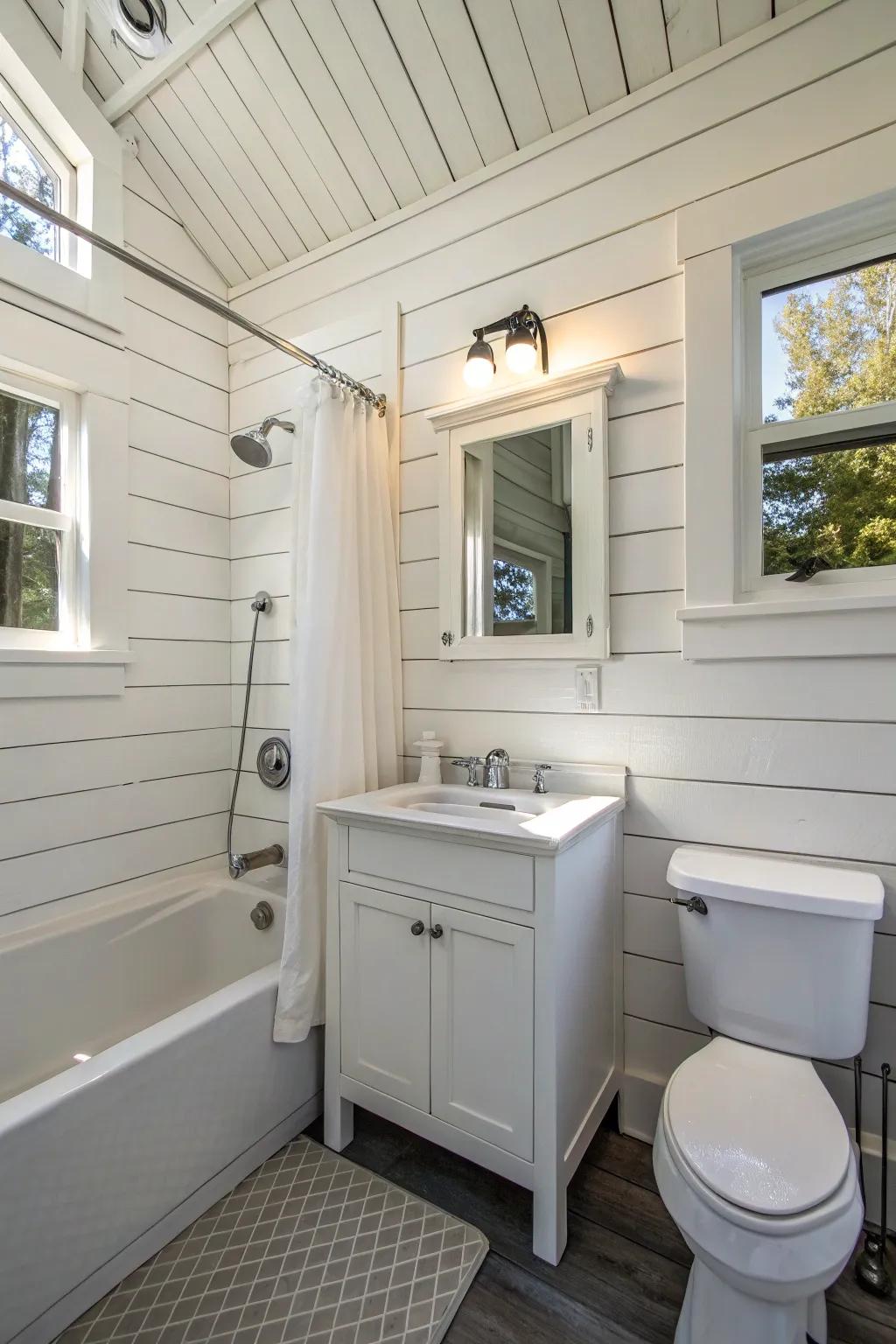 A small bathroom with white board and batten for added charm.
