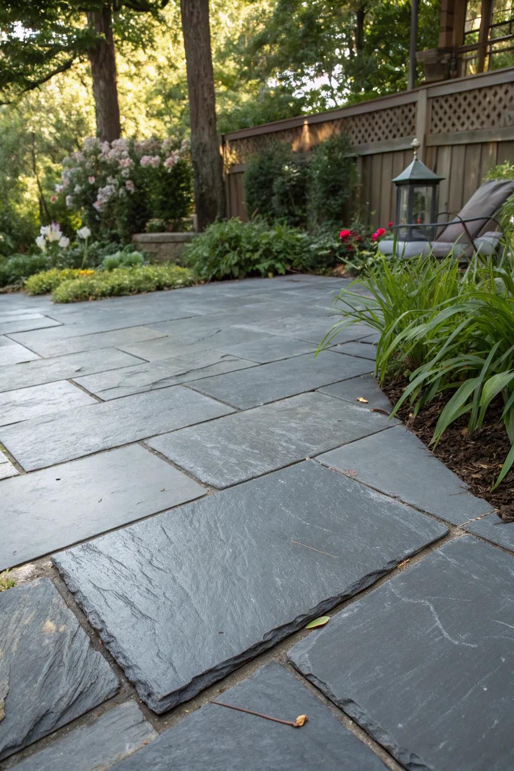 An eco-friendly slate patio employing reclaimed materials.