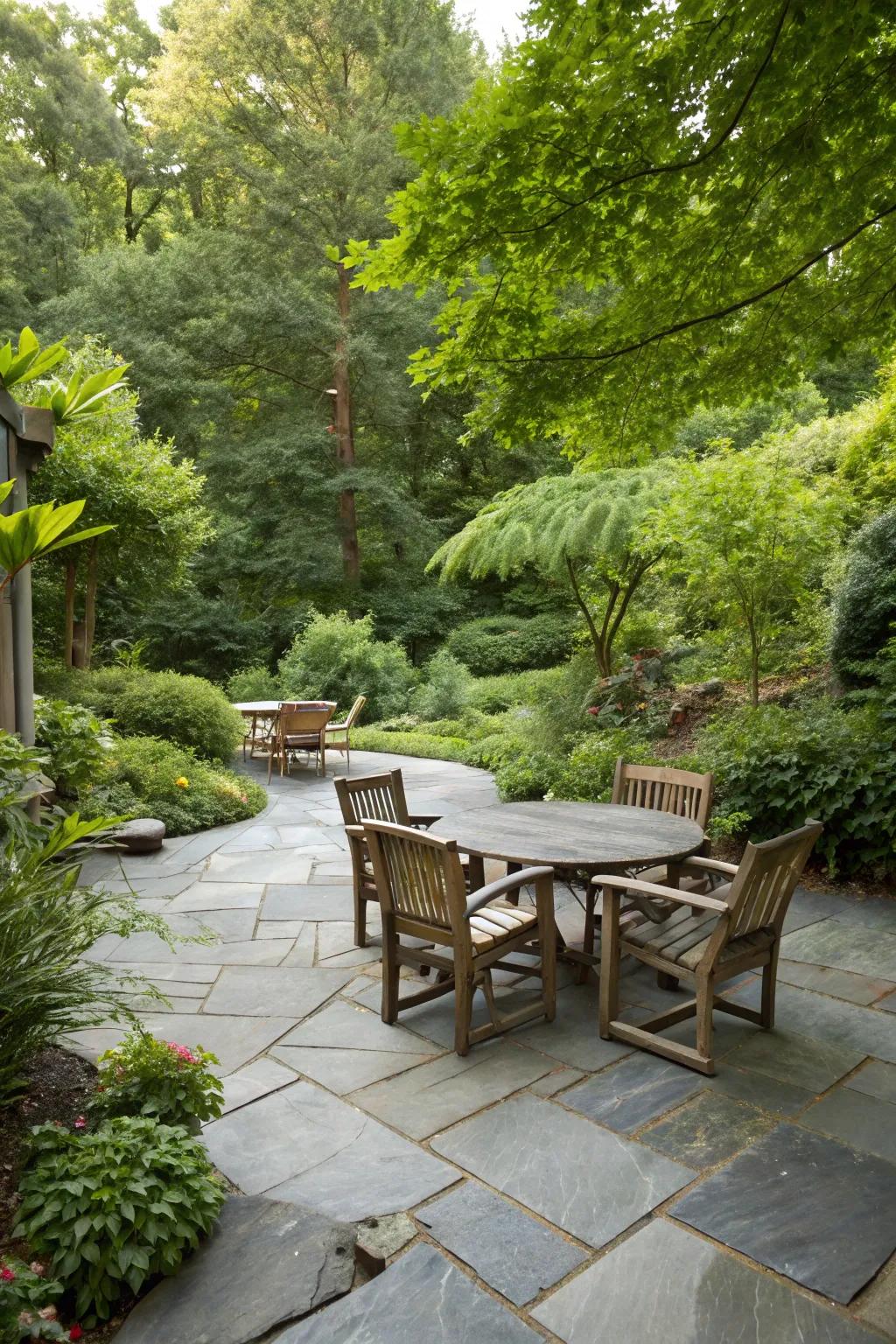 A comfortable slate patio complemented by unrefined wooden furniture.