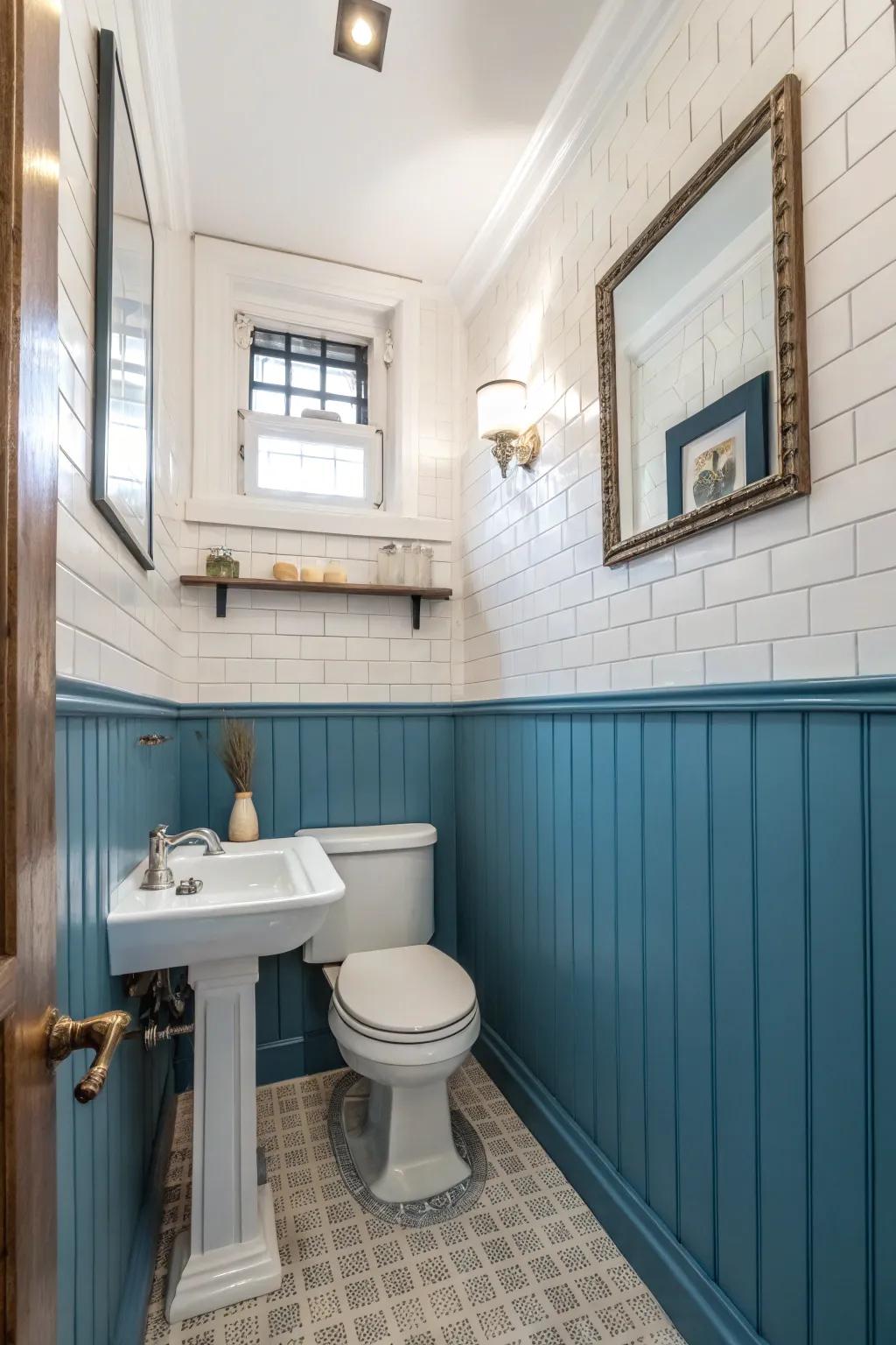 Blue wainscoting provides a classic and sophisticated element to the bathroom design.