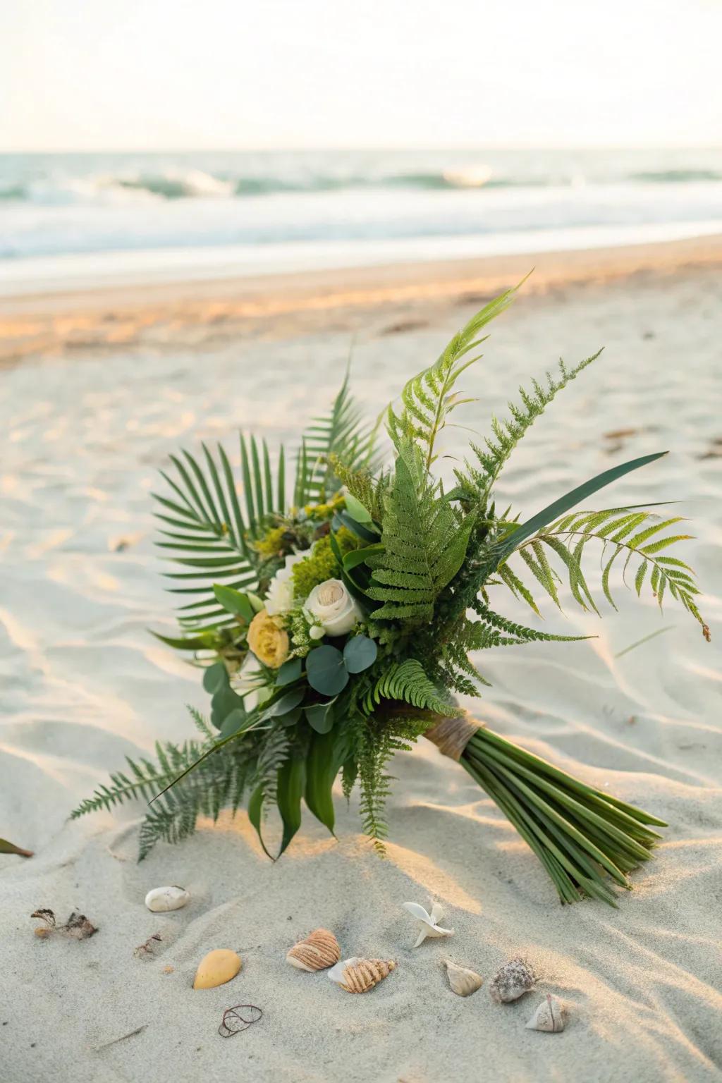 A green, leafy bouquet that complements the natural beauty of the beach.