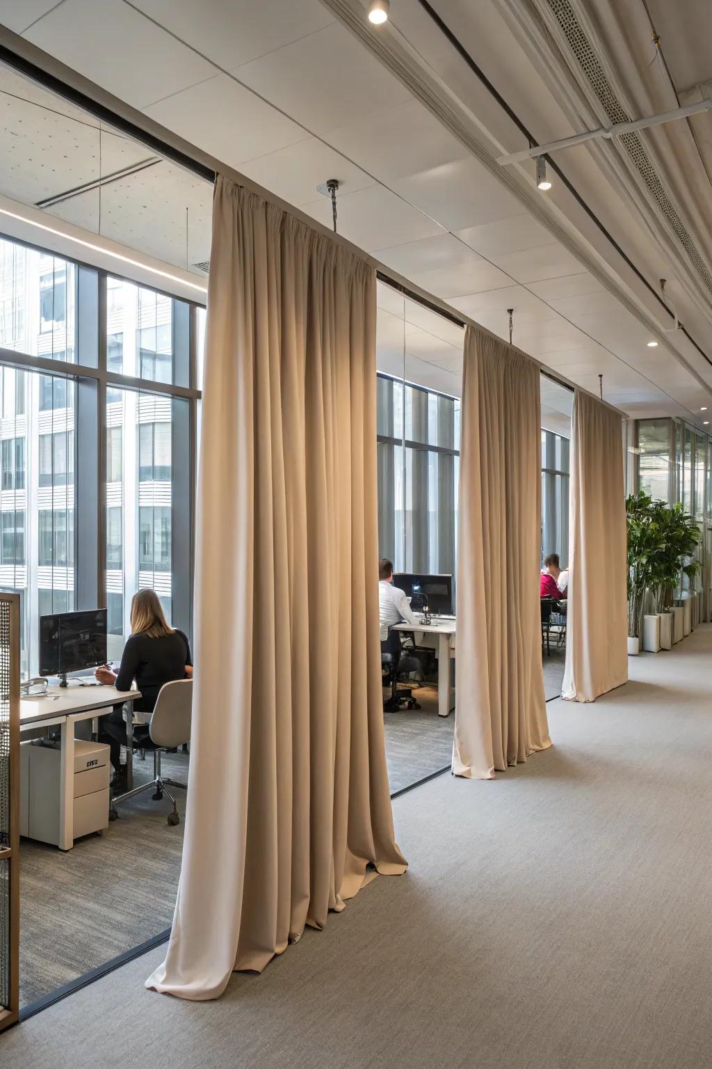 Fabric dividers incorporate softness and flexibility into office designs.