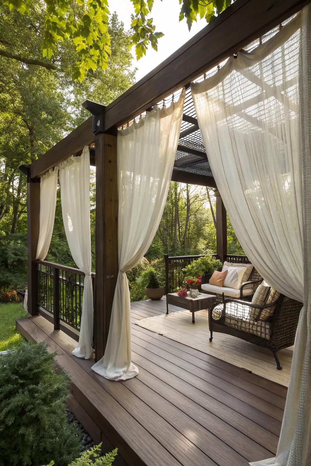 Flowing outdoor curtains create a private and serene deck space.