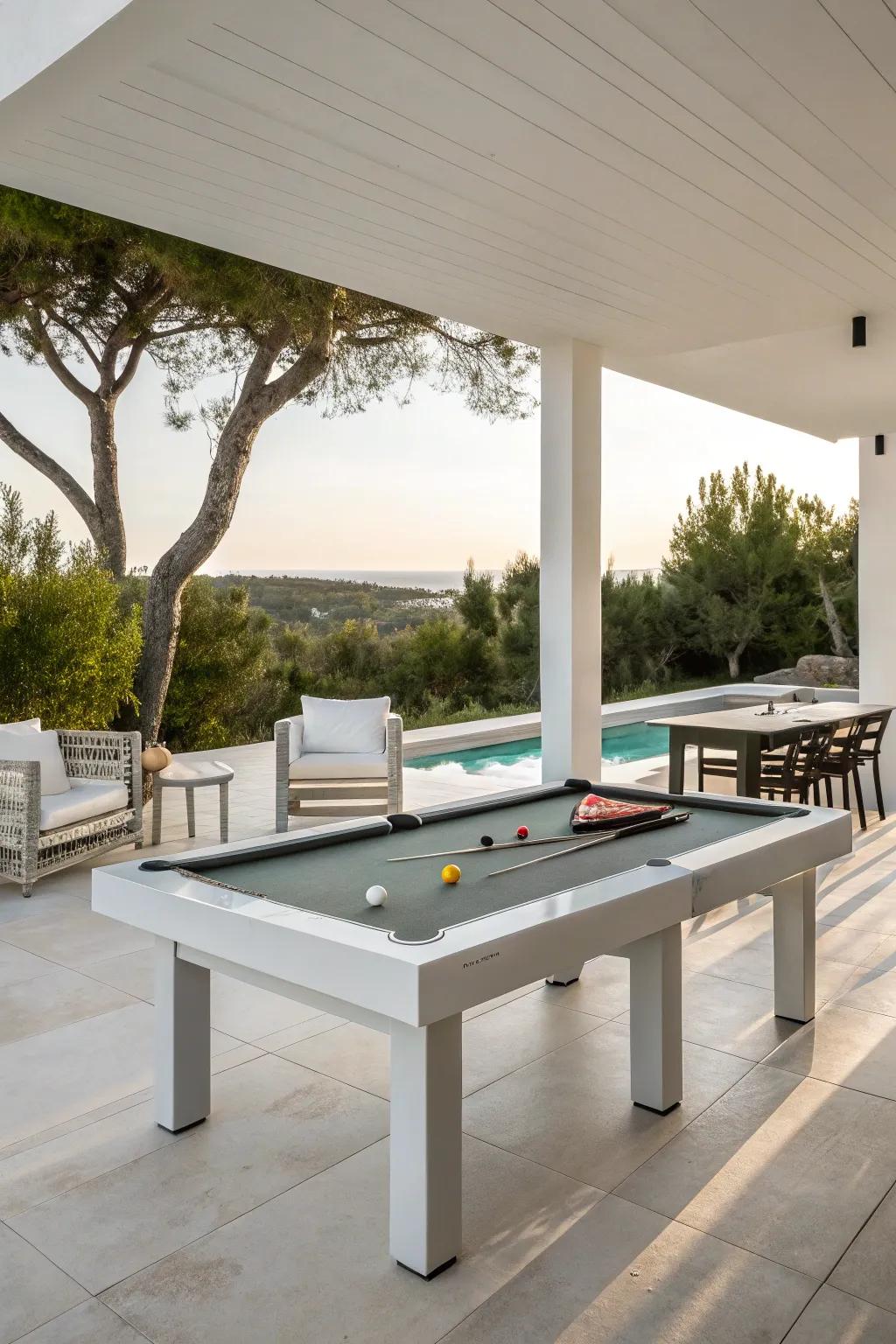 An elegant, contemporary outdoor billiards table setup featuring minimalist furniture.