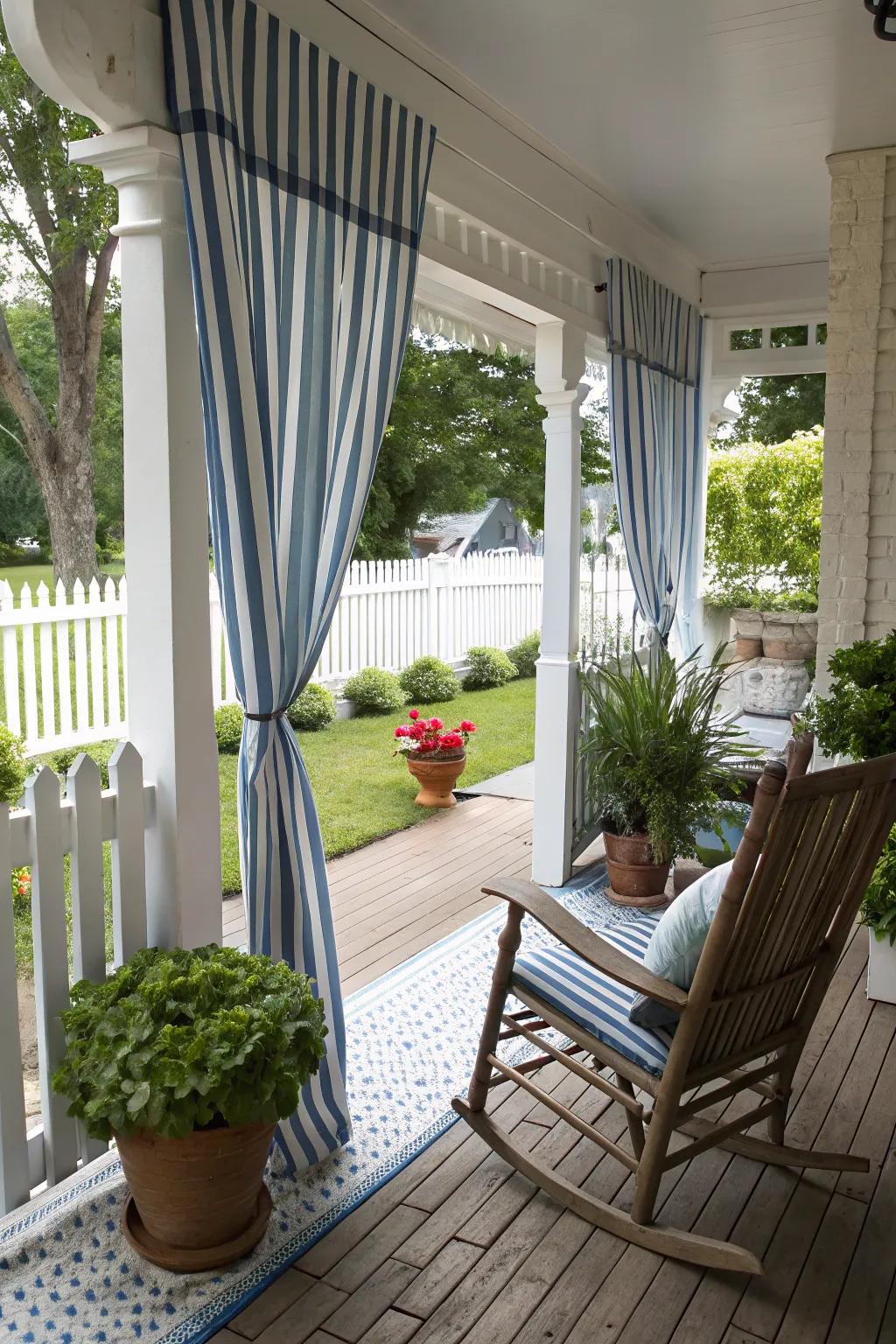 Striped curtains create a classic and spacious look on your porch.