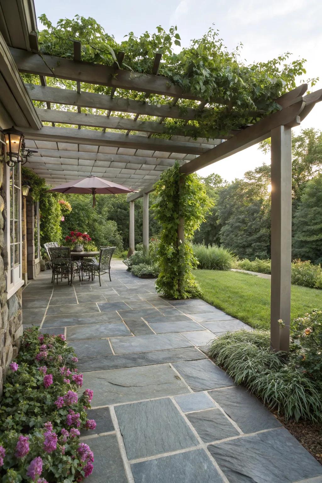 A slate patio enhanced by a timber canopy.