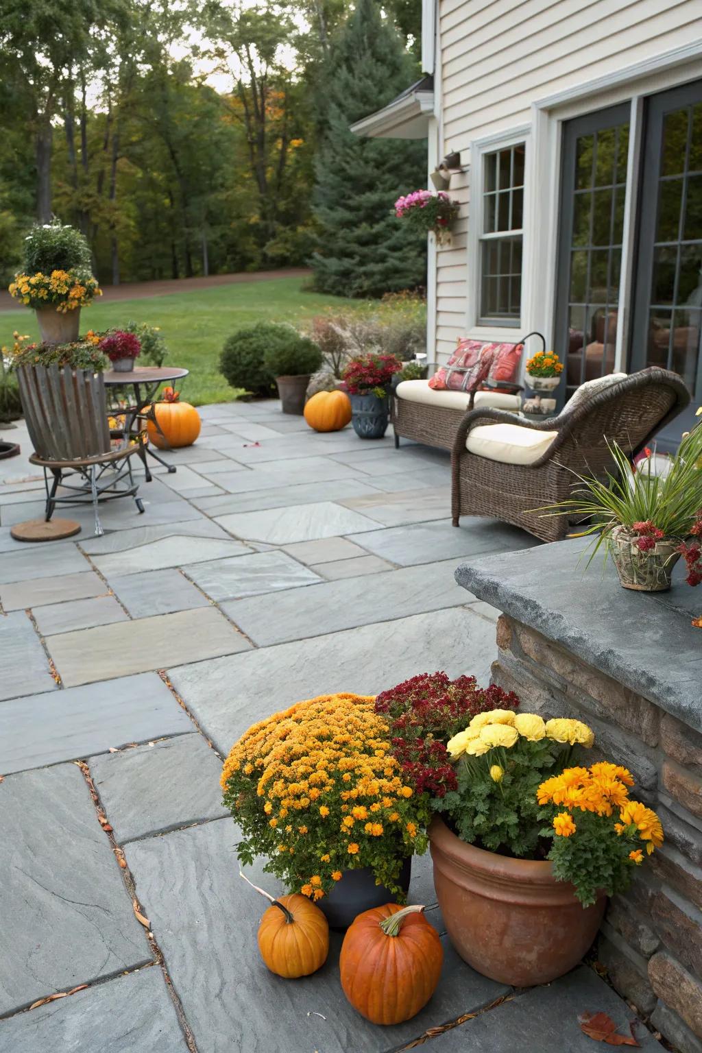 A slate patio adorned with charming seasonal decoration.