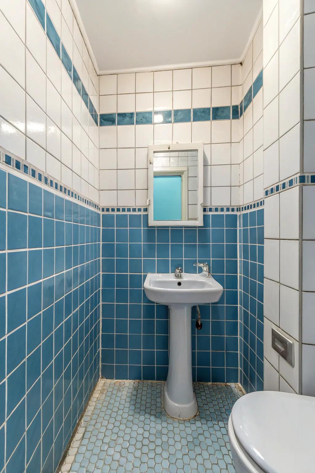 Blue tiles outlined with white grout offer a clean and sophisticated look.