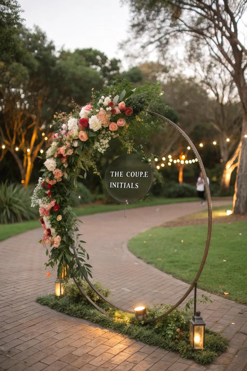 A personalized round wedding arch featuring couple's initials.
