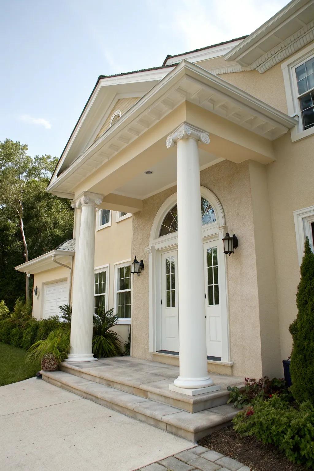 White front door maintains a clean and elegant aesthetic for a beige house.