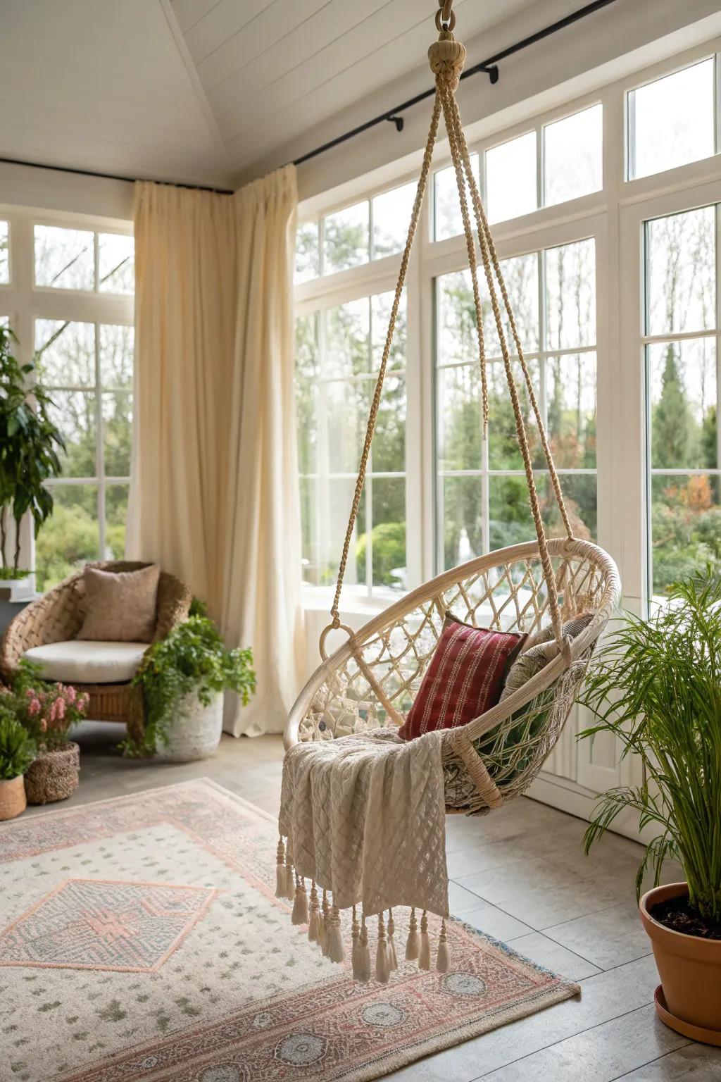 A swing chair adds a touch of whimsy to the sunroom.