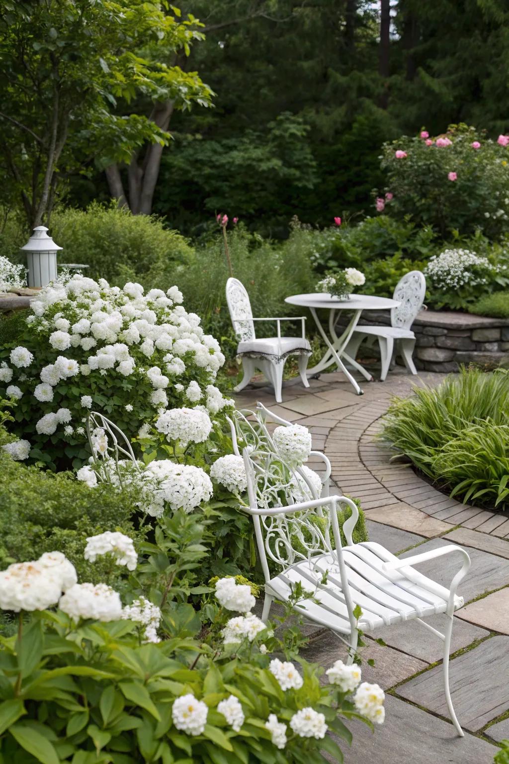 White garden fixtures complements the serene aesthetic of a white garden.